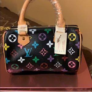 Mini wristlet not authentic